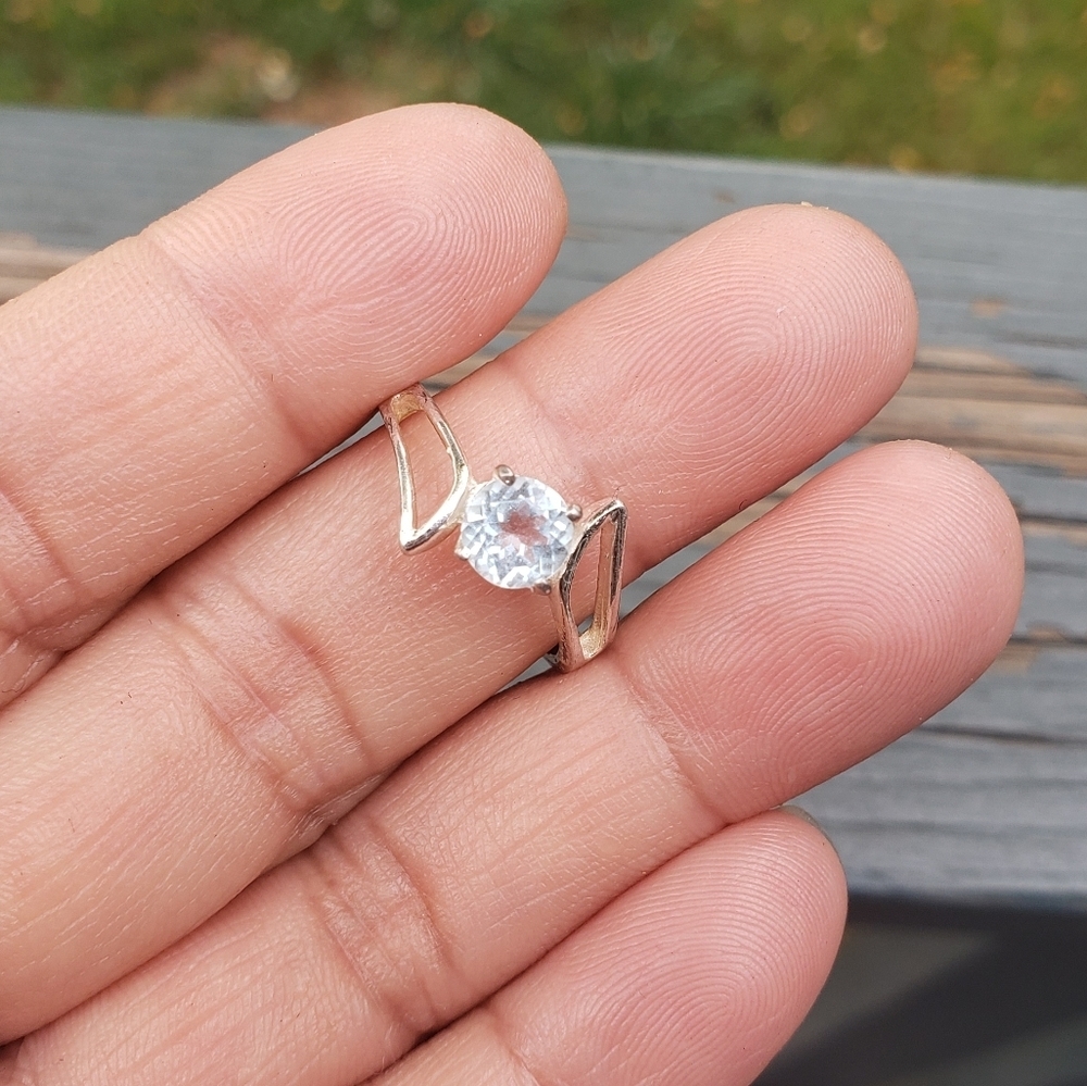 925 stamped sterling silver ring with blue topaz stone